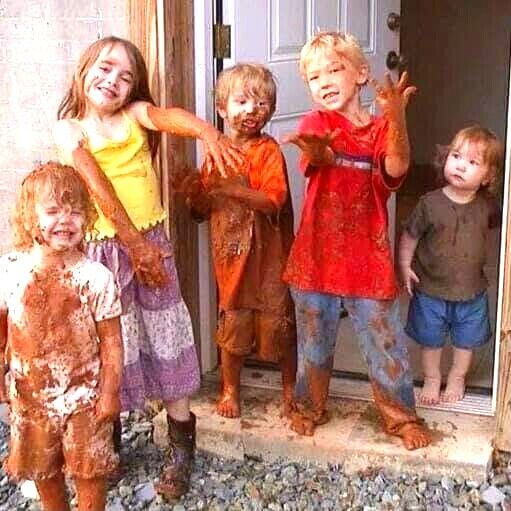 Bailey, Maddy, Roanin, Zack, and Gracie covered in mud after playing outside
